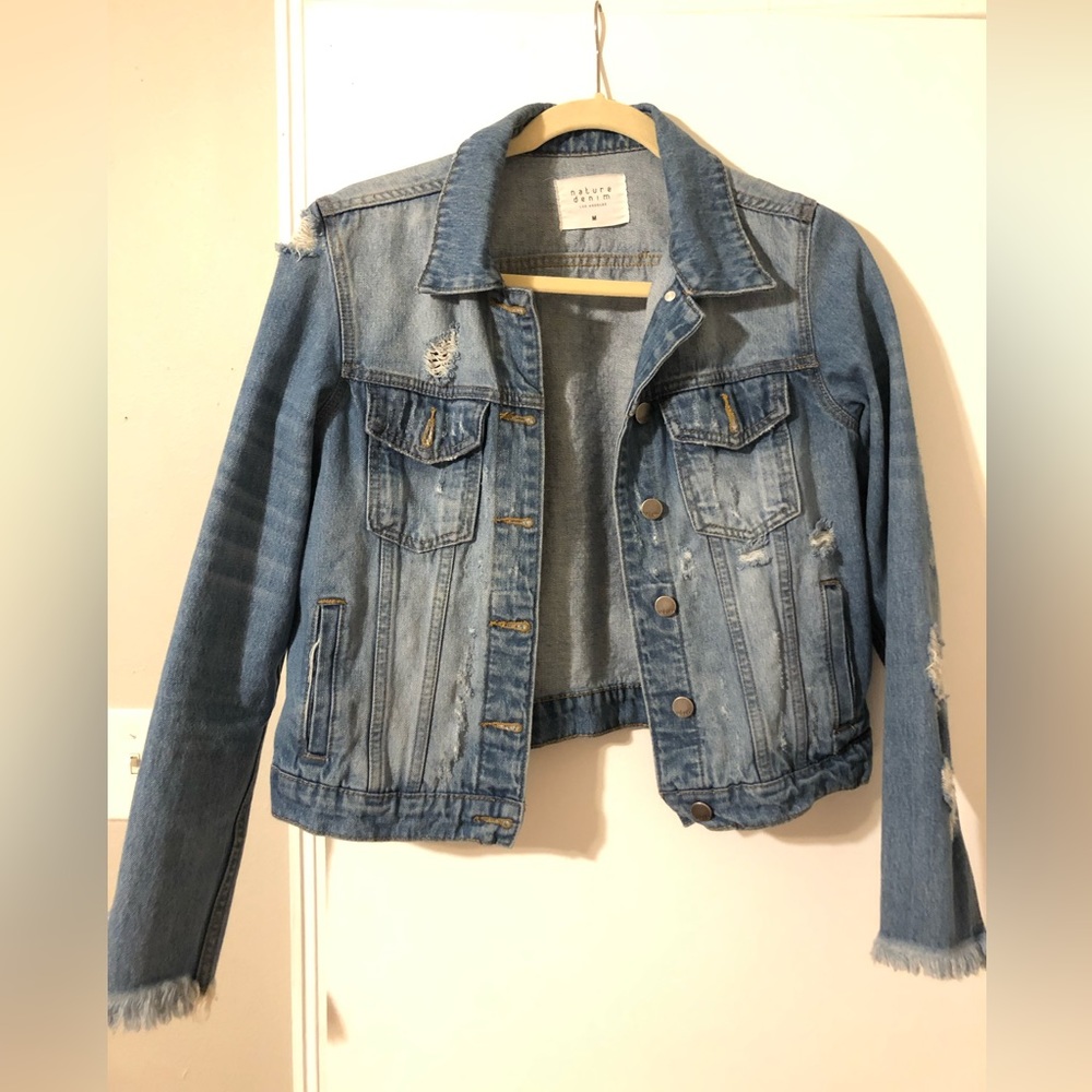 Woman’s distressed jean jacket